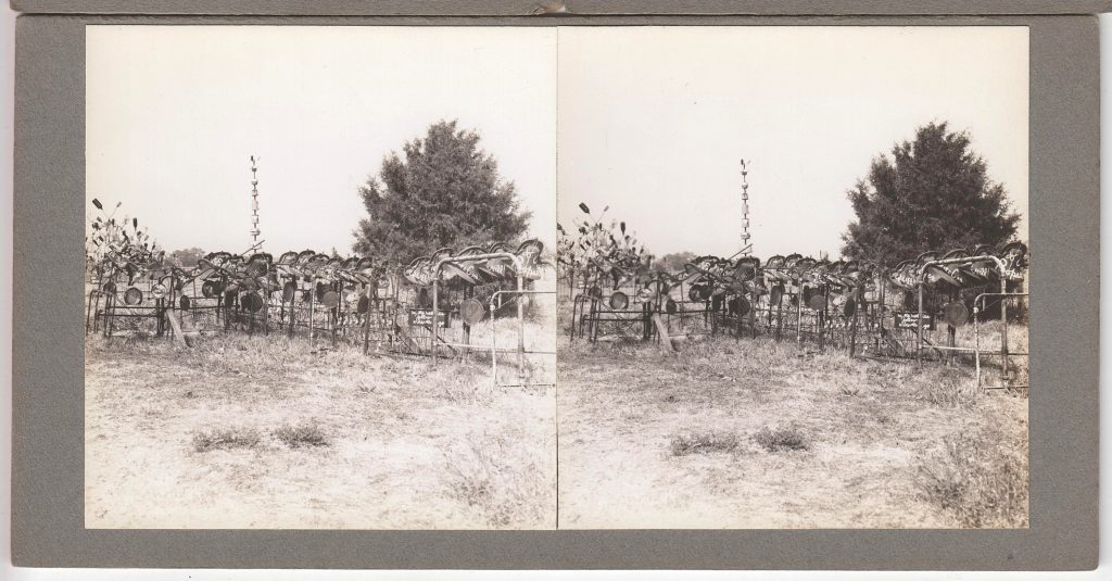 Winter Zero's Bottle Farm, September 27, 1939, bells, bedsteads and bottle trees.