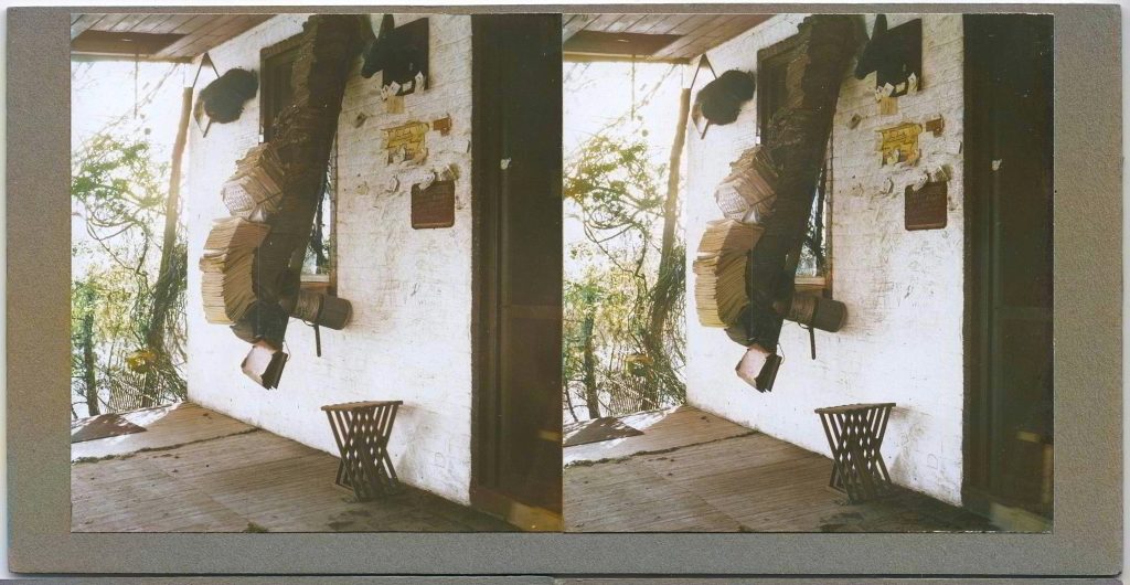 Winter Zero's Bottle Farm, porch with magazine holder colorized, October 12, 1939
